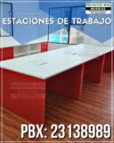 Estaciones de trabajo en melamina color blanco combinado con rojo tipo coworking