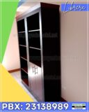 librera doble en melamina con marco decorativo y corona